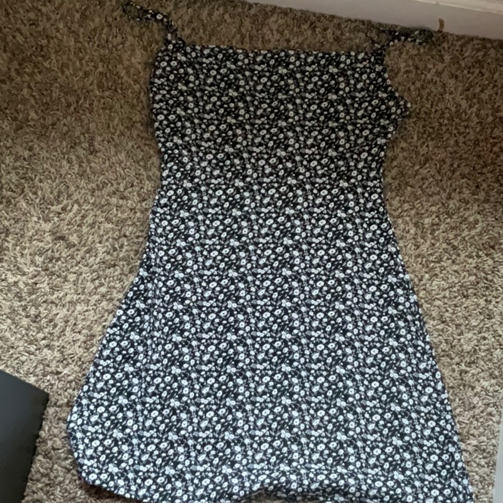 Black floral dress with cute back design and zipper on the side for easy entry